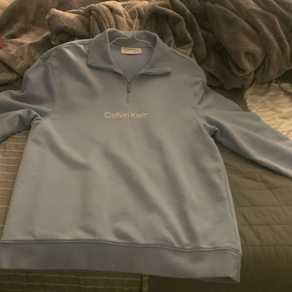 Calvin Klein baby blue long sleeve size medium.
